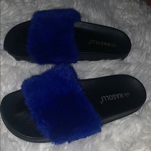 Blue faux fur slides